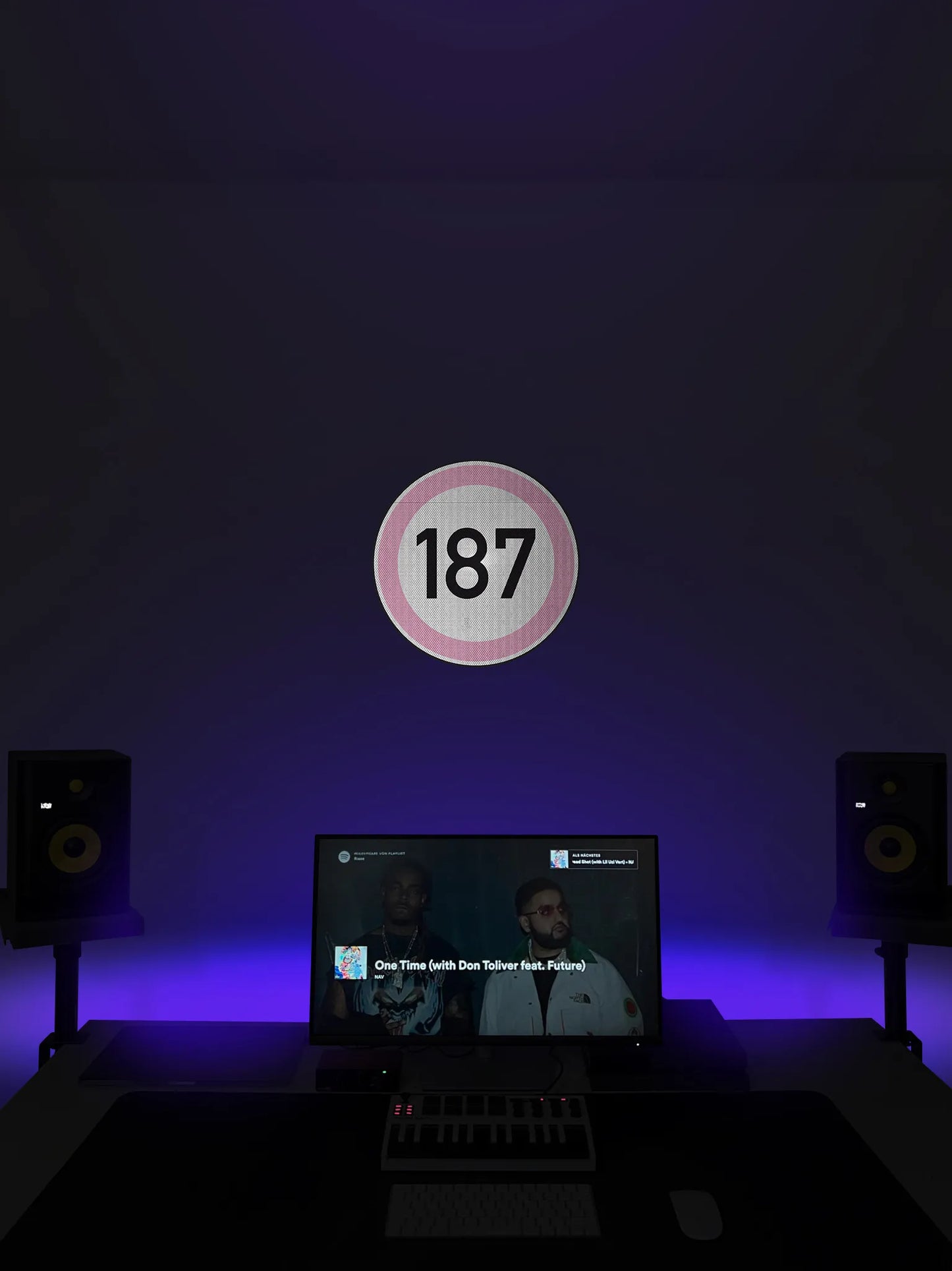 Speed limit 187 (pink) street sign